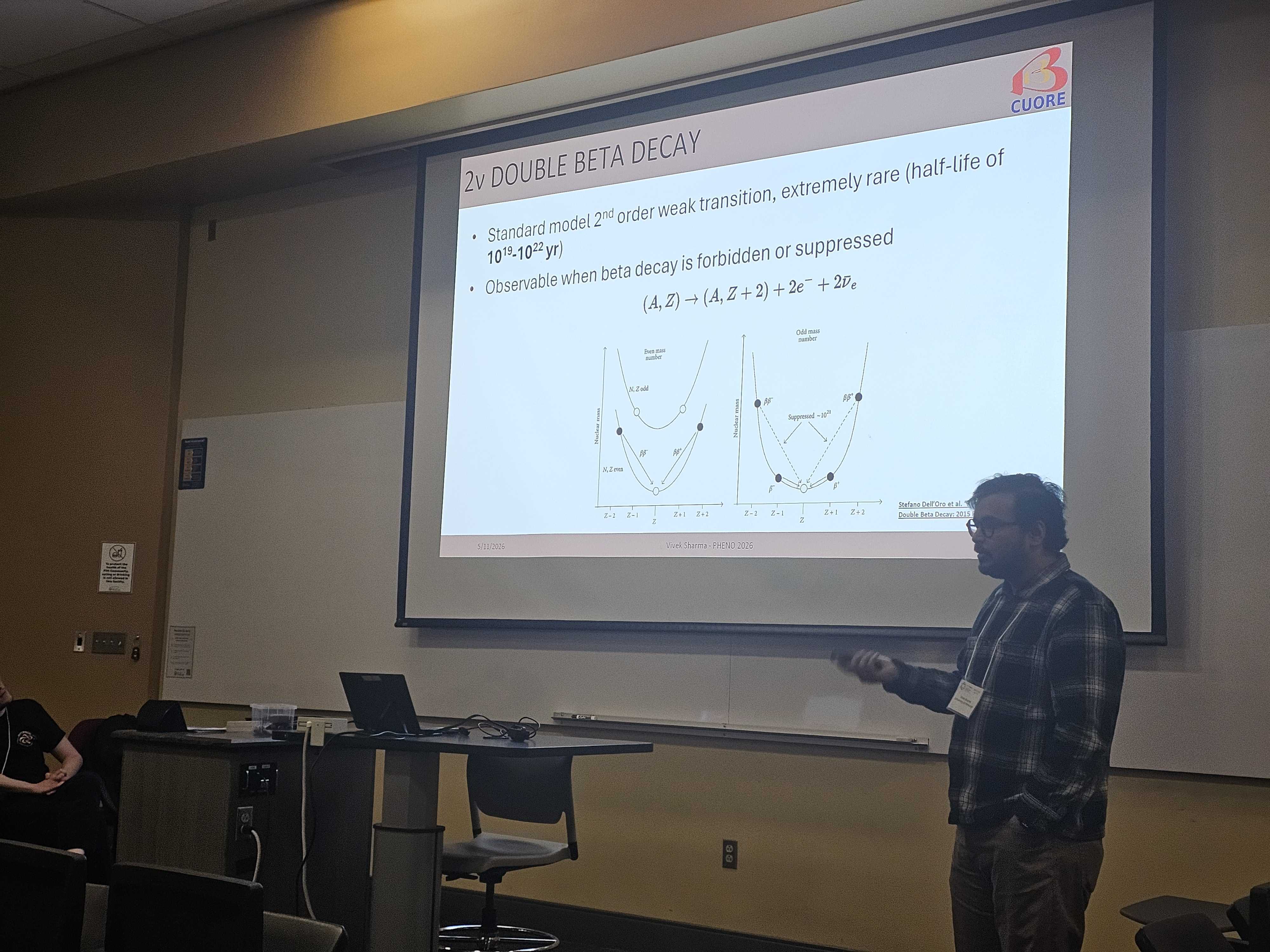 Vivek presenting on searching for Baryon Number Violation with CUORE